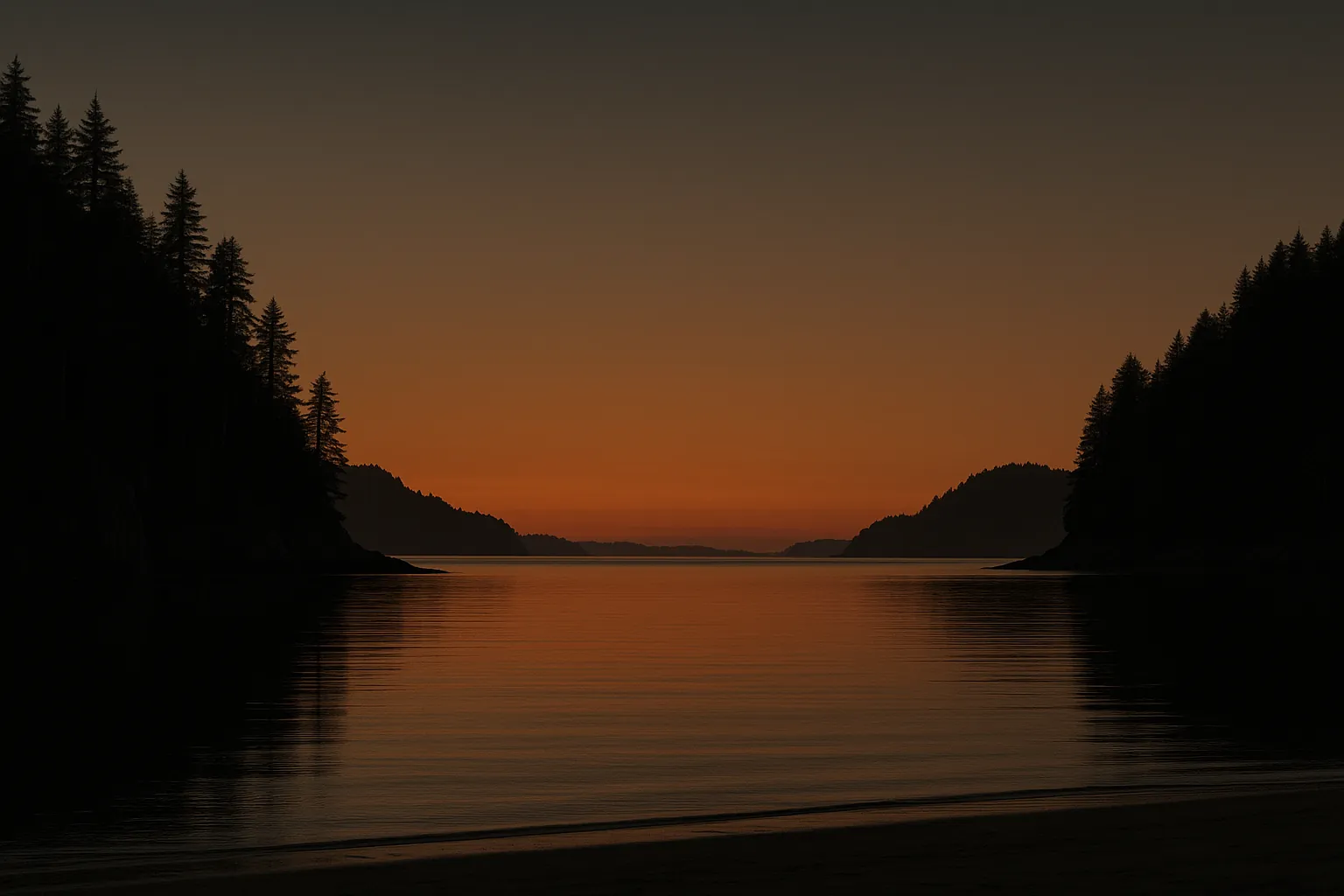 A calm Vancouver Island inlet at dusk, dark forested headlands either side and a low band of amber and ember sunset colour along the horizon.